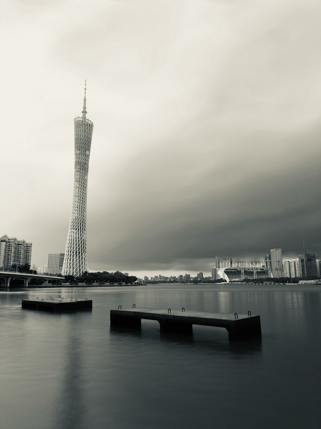 city skyline under gray sky during daytime