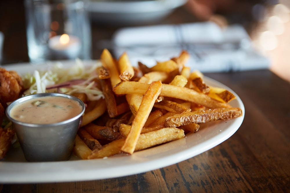 potato fries on white ceramic plate