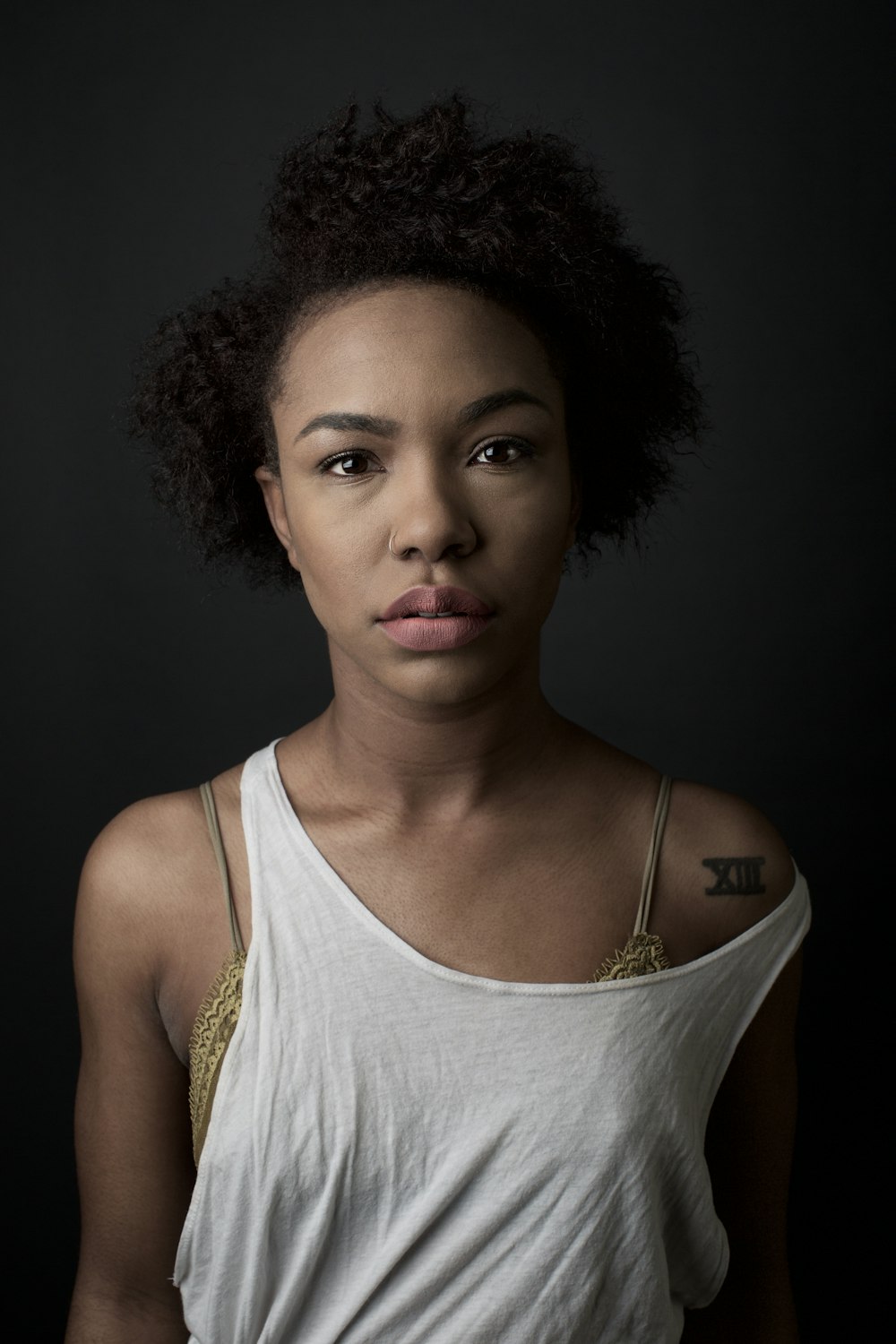 woman in white tank top