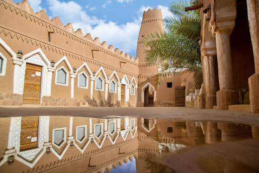 brown concrete building under blue sky during daytime