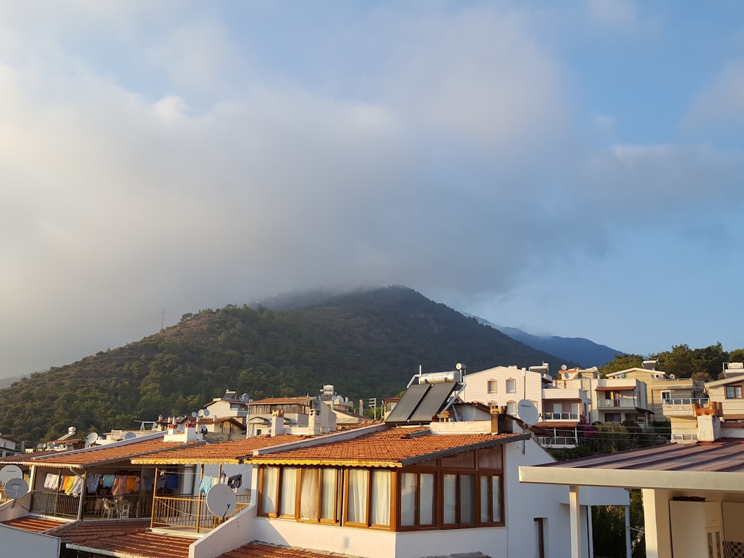 white and brown concrete house near green mountain under white clouds during daytime, This is my 2019 summer view 2</p></figure><p>#summer #beach #sun #sand #sunny #vacation #view #houses #mountain
