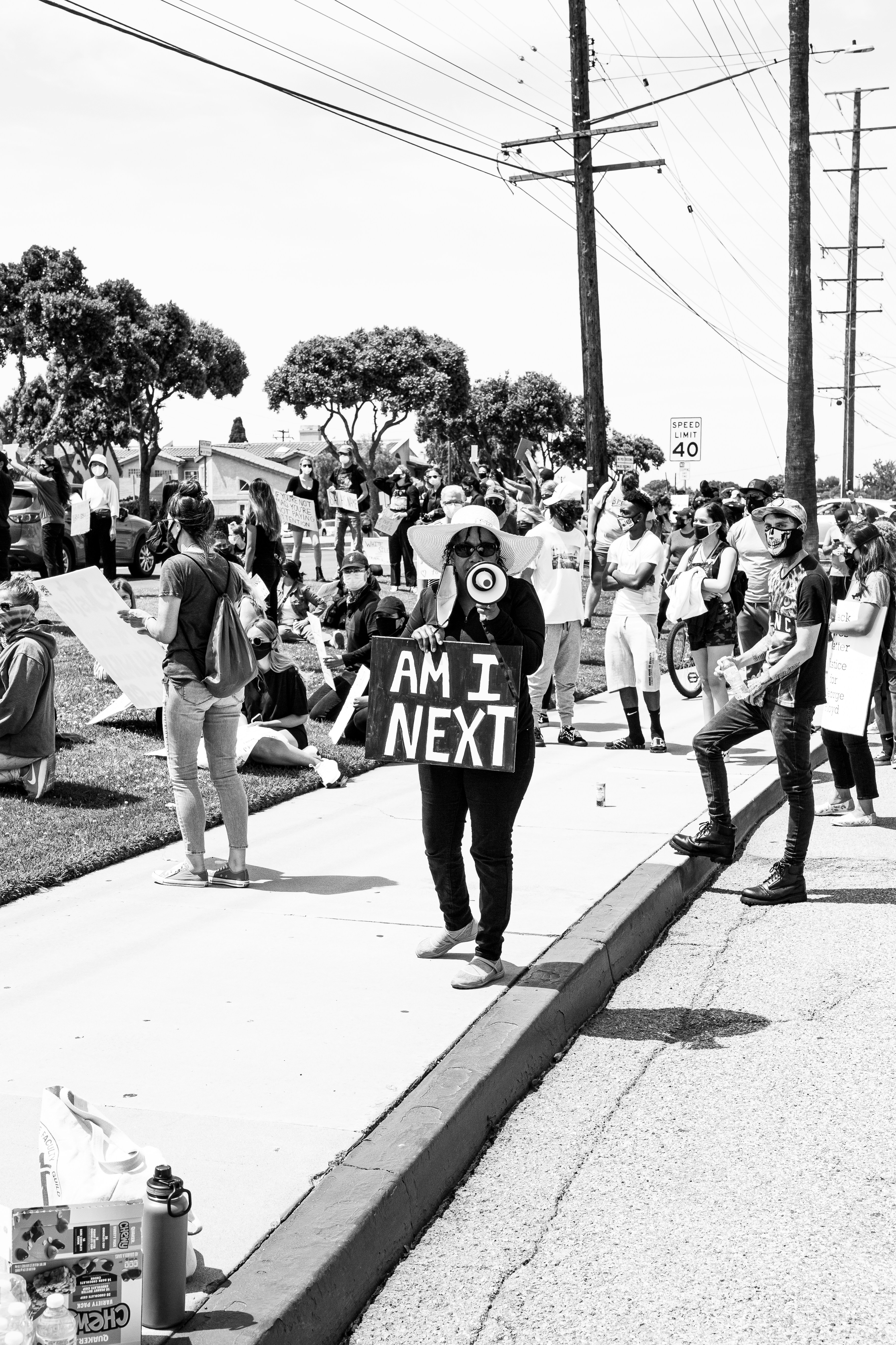 grayscale photo of people walking on street
