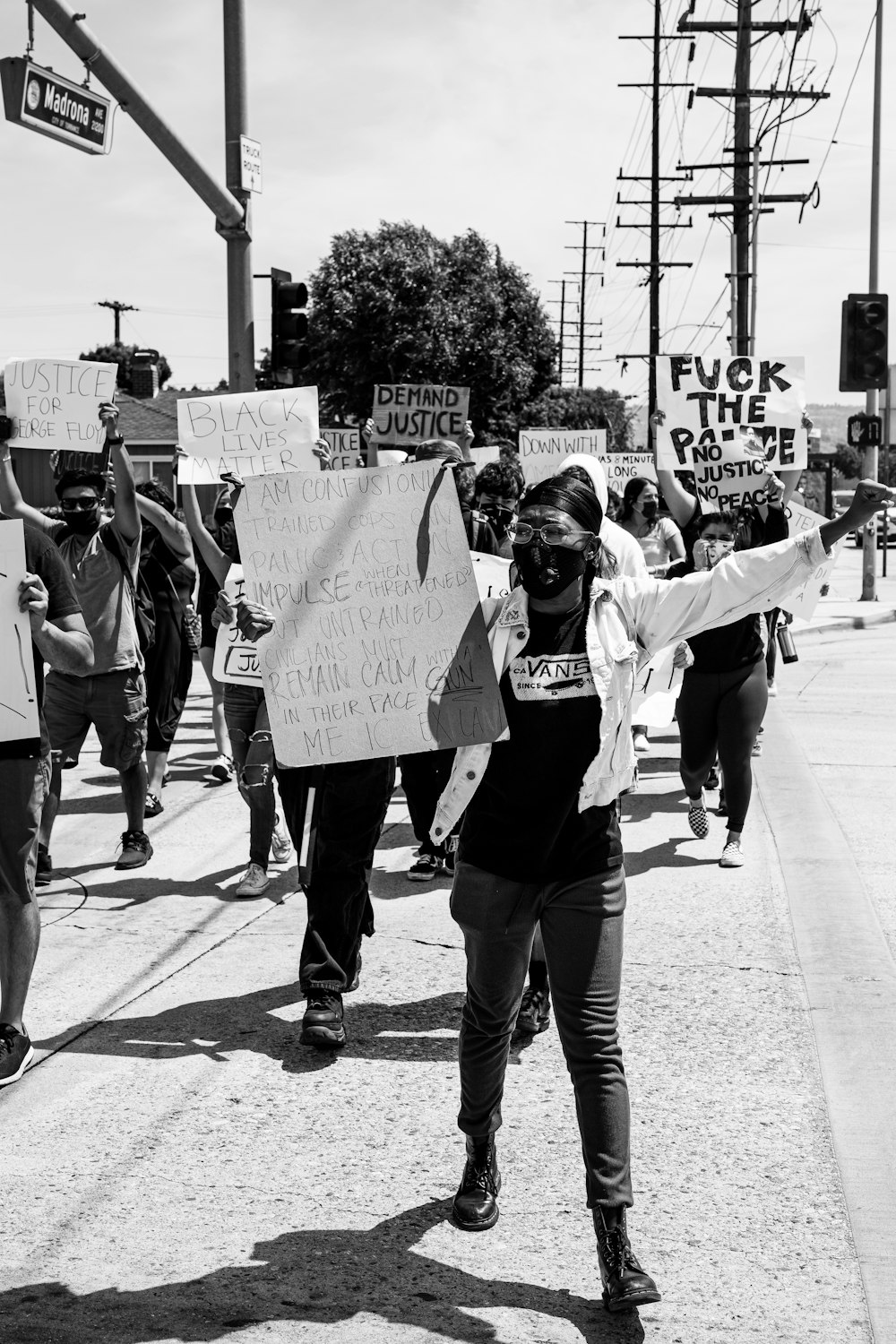 grayscale photo of people walking on street