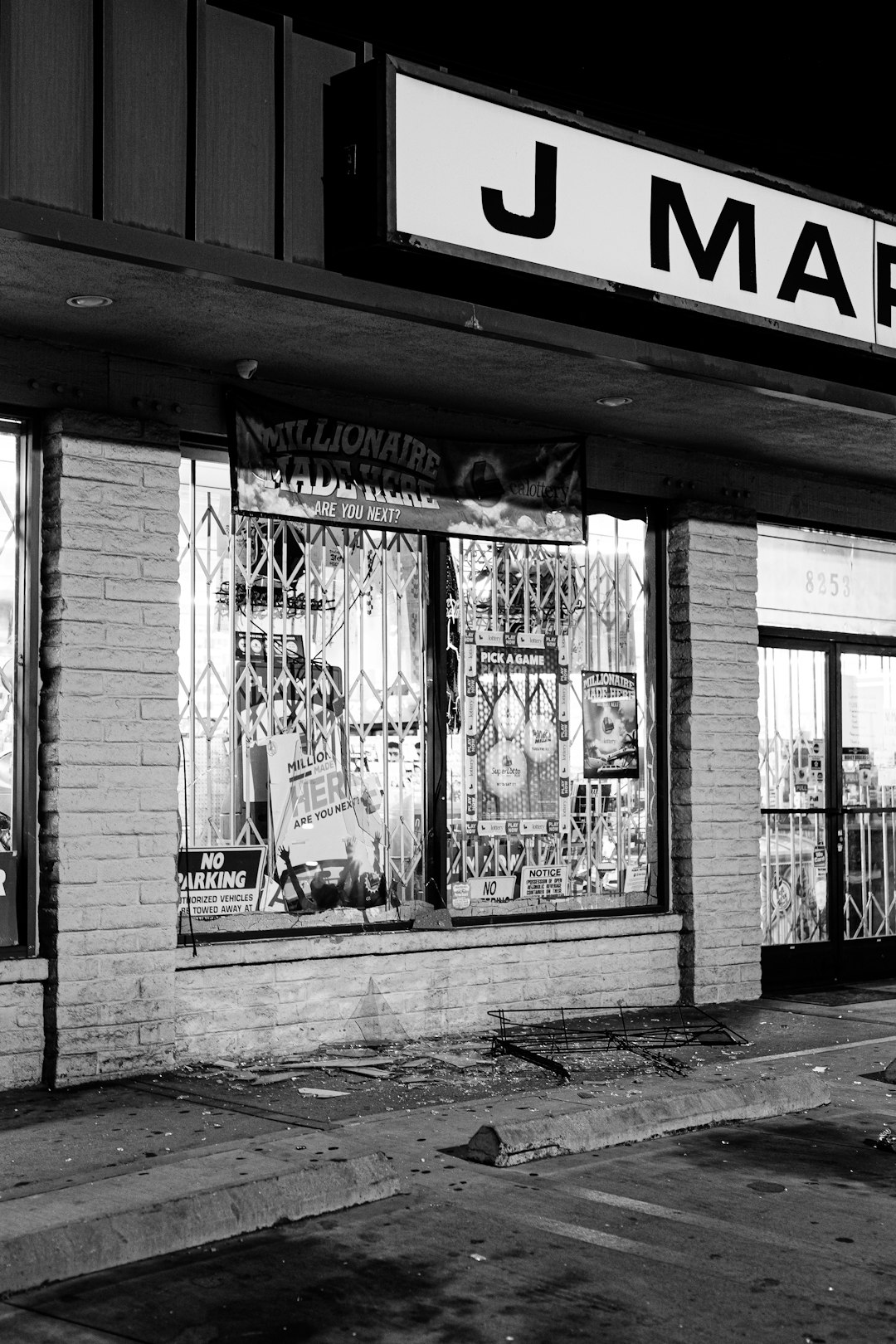 grayscale photo of store front