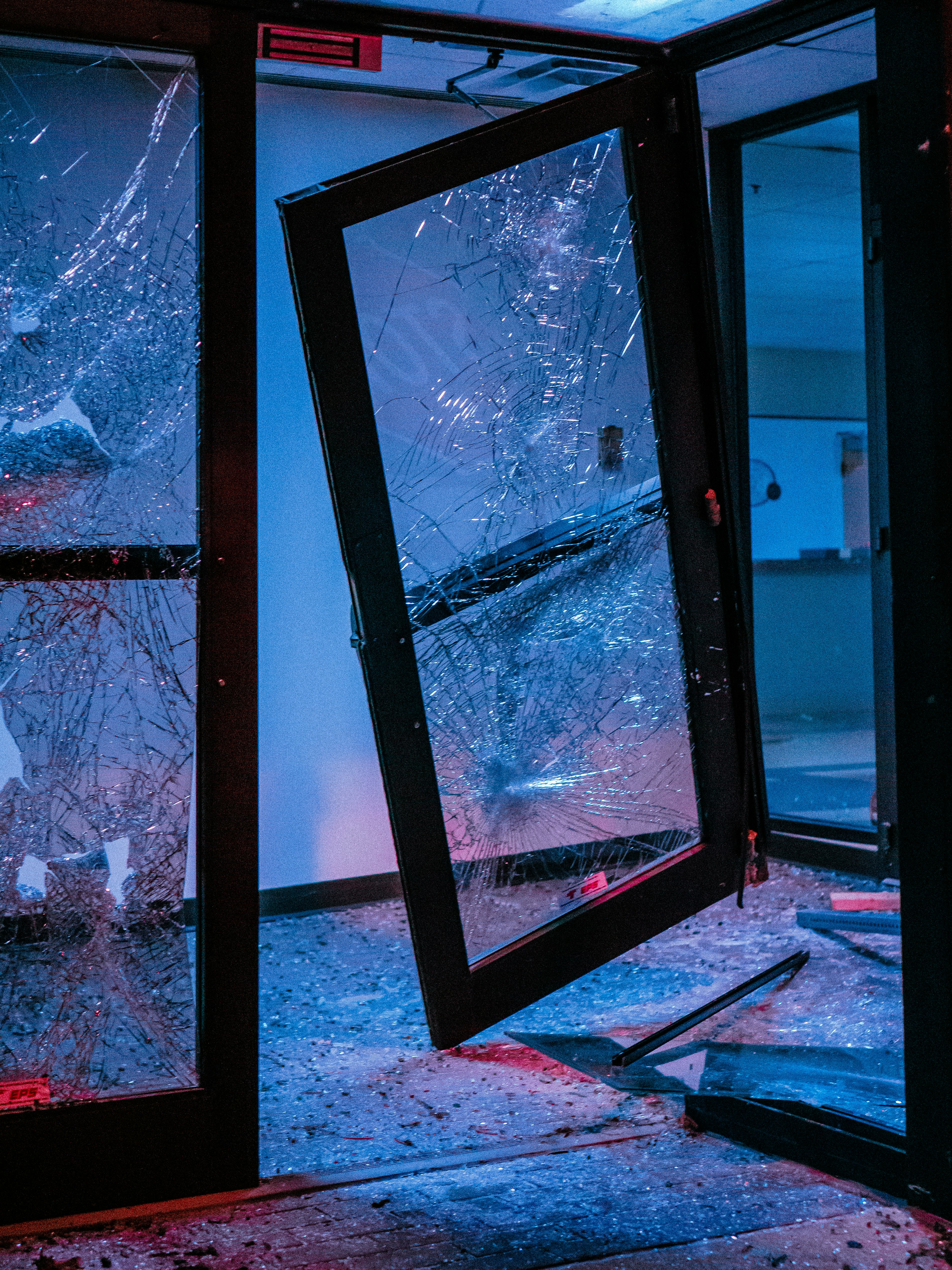 black framed glass window with white snow