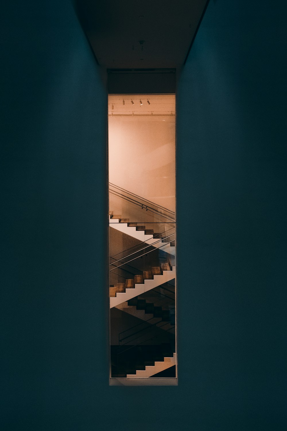 white and brown wooden staircase