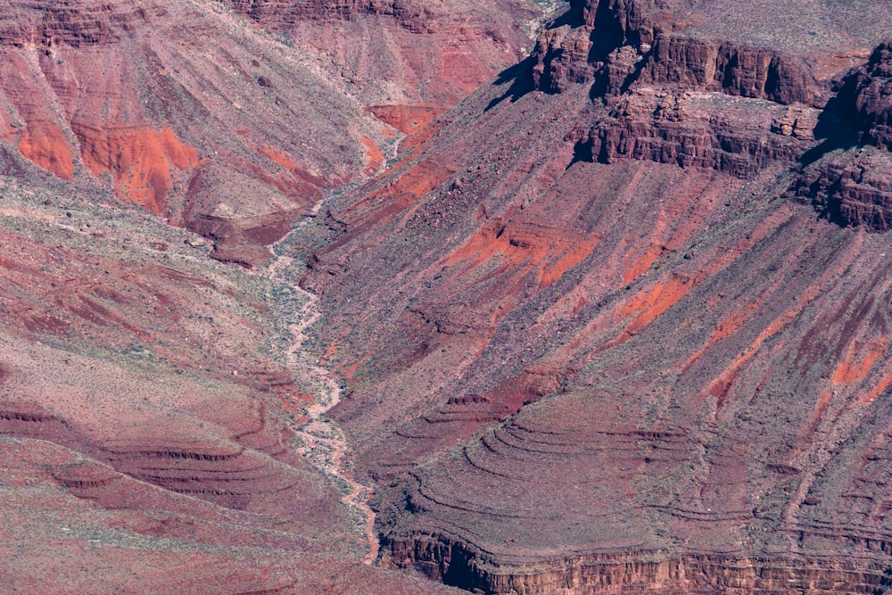 brown and gray mountains under white sky during daytime