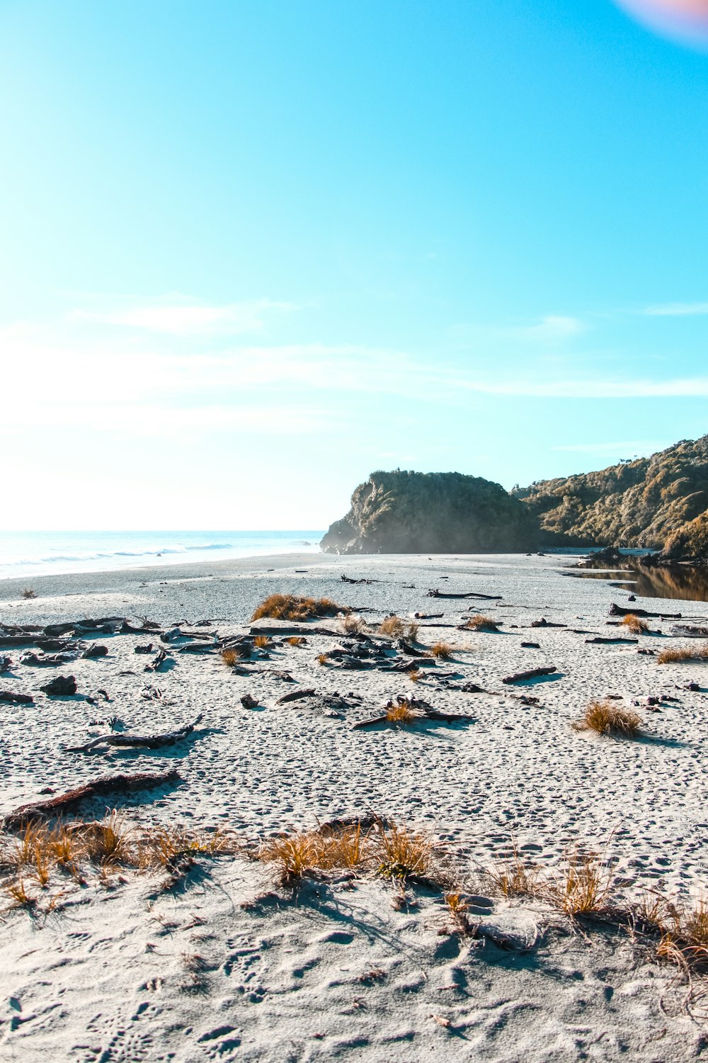 blue and white stones on seashore during daytime