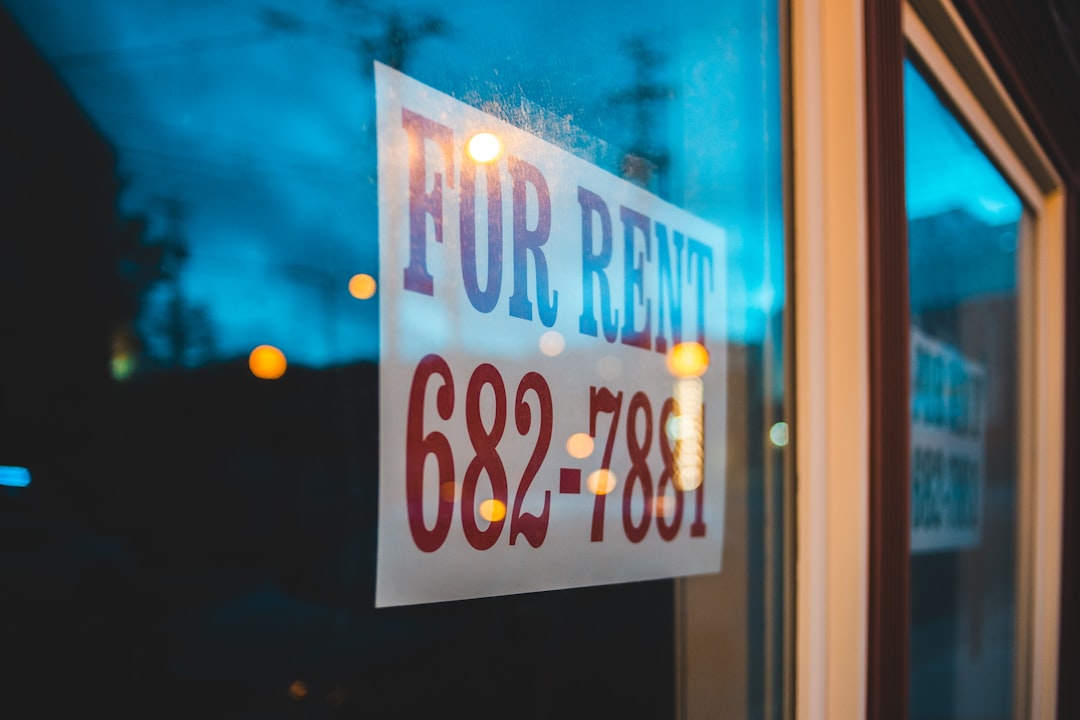 'For Rent' Sign on Window Screen