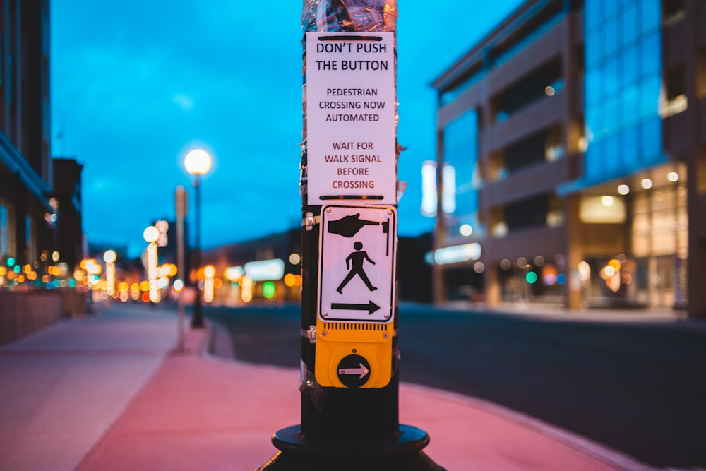 black and yellow street sign