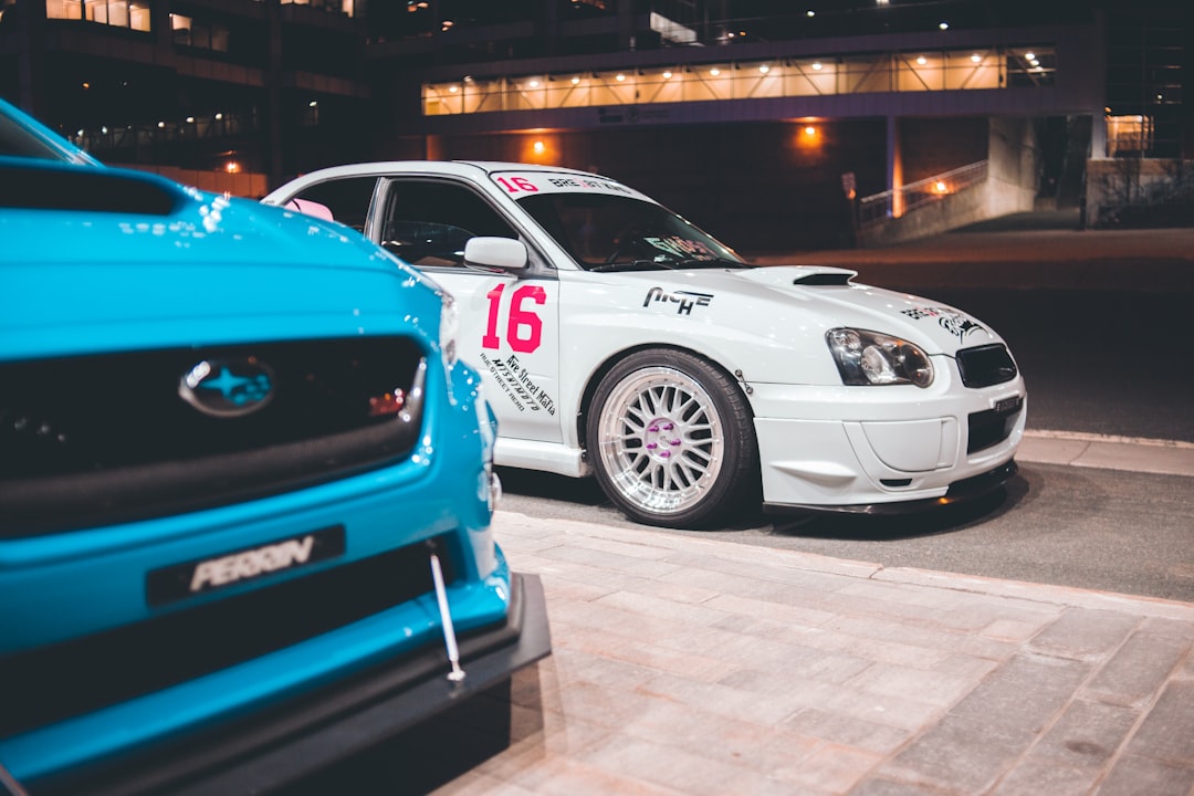 white and blue bmw m 3 coupe