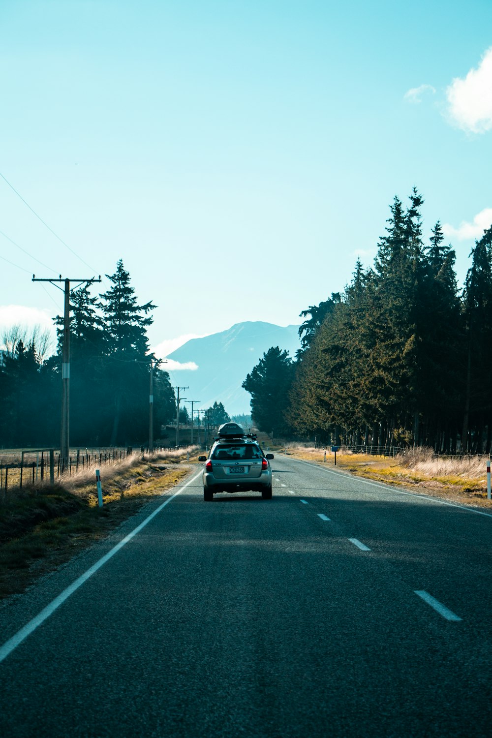 black car on road during daytime