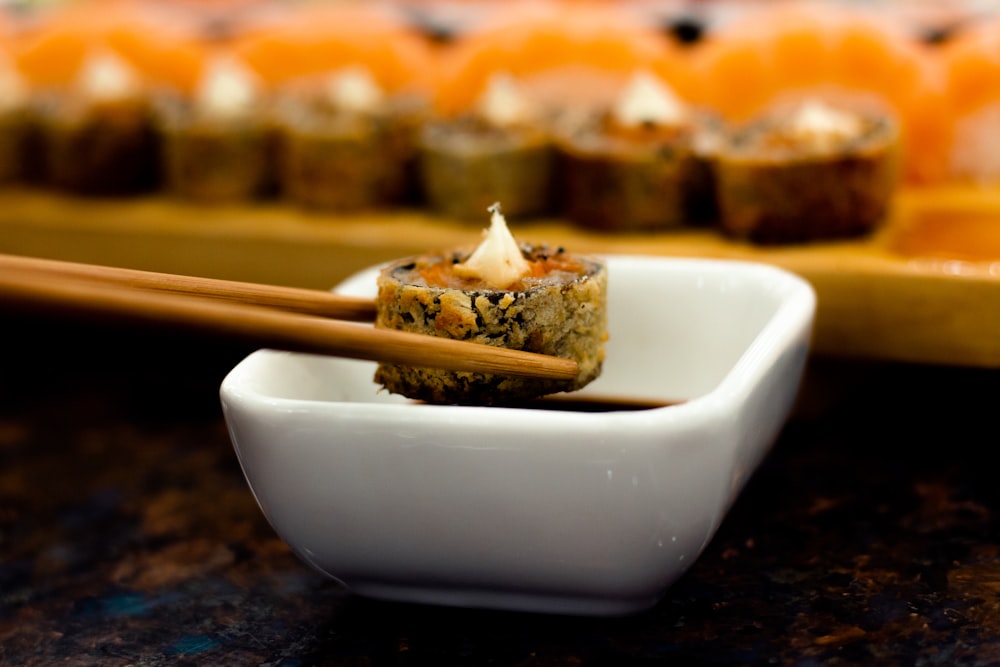 brown and white pastry on white ceramic bowl