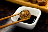 brown and black pastry on white ceramic tray