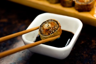 brown and black pastry on white ceramic tray