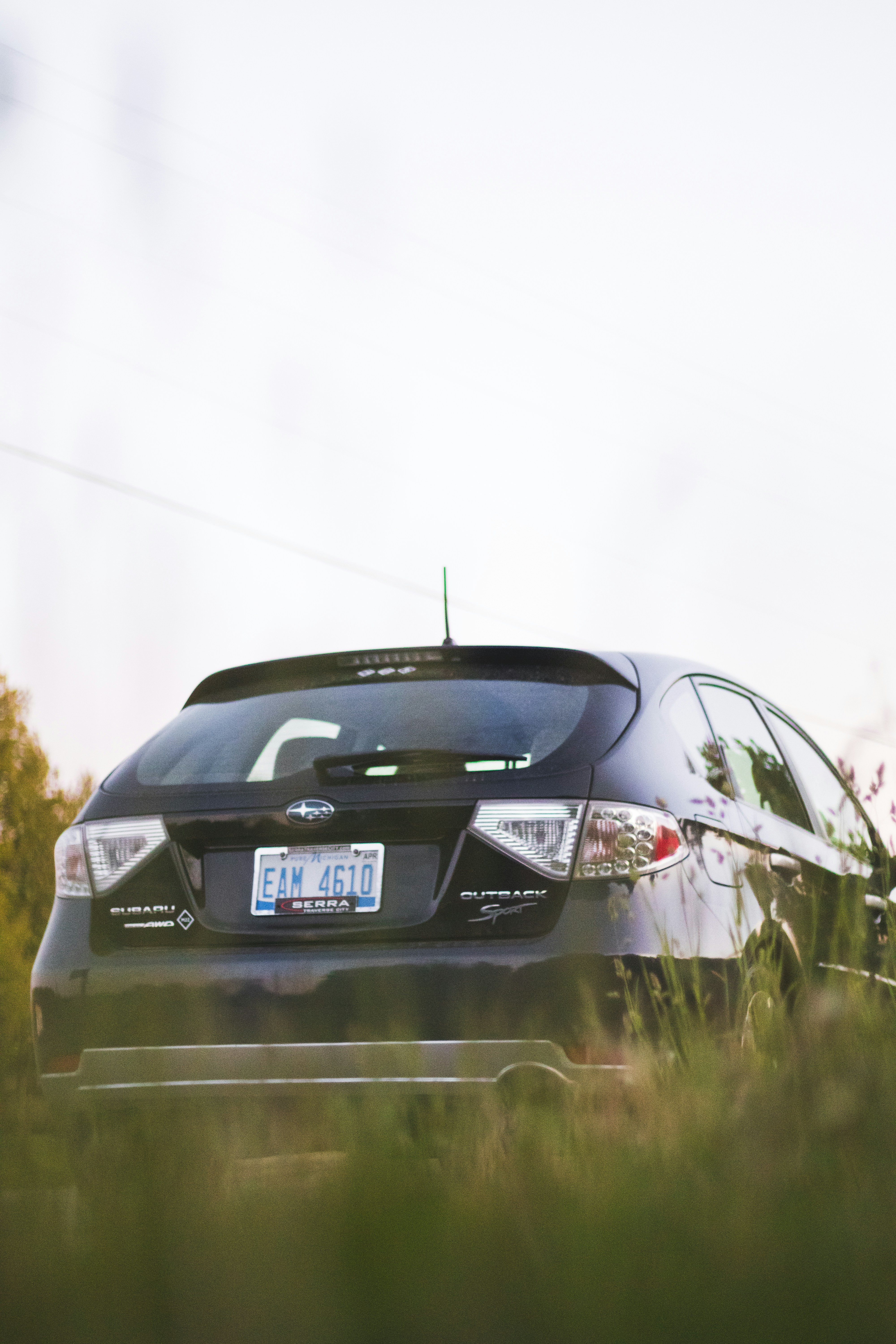 black honda car on road during daytime