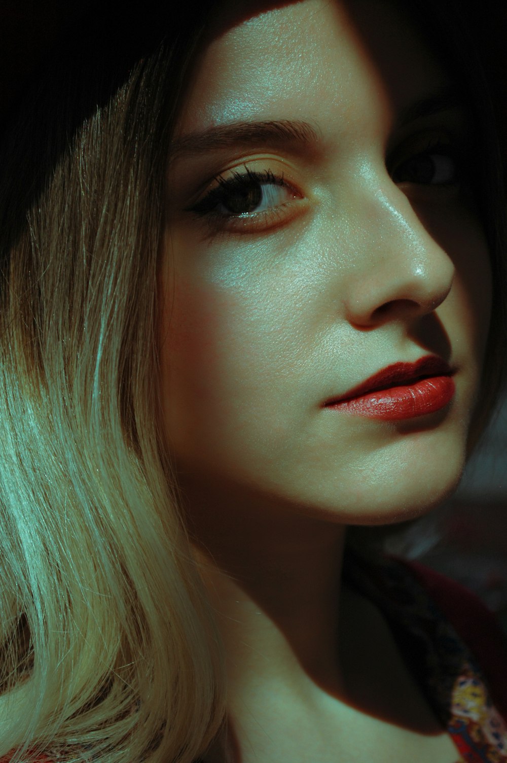 woman with red lipstick and blonde hair