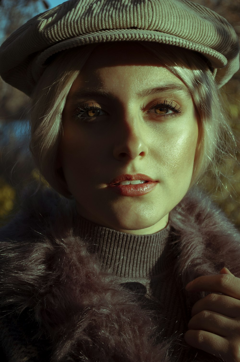 woman in black and white fur coat