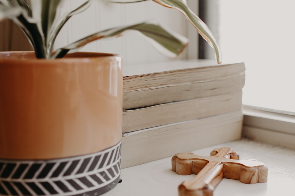 brown ceramic mug on white table