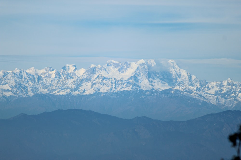 snow covered mountain during daytime