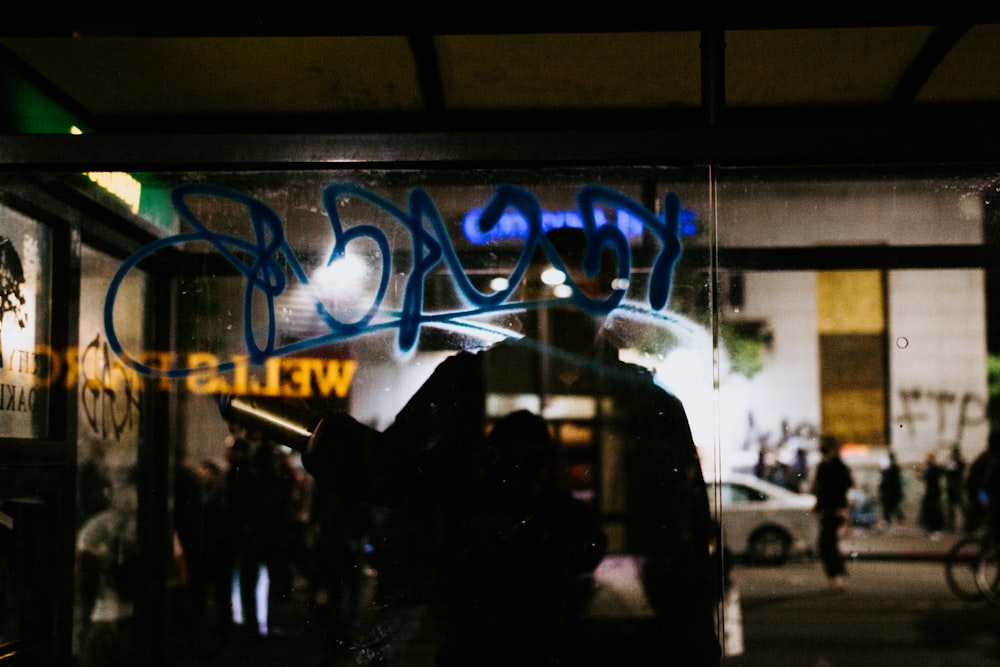 blue and white neon light signage