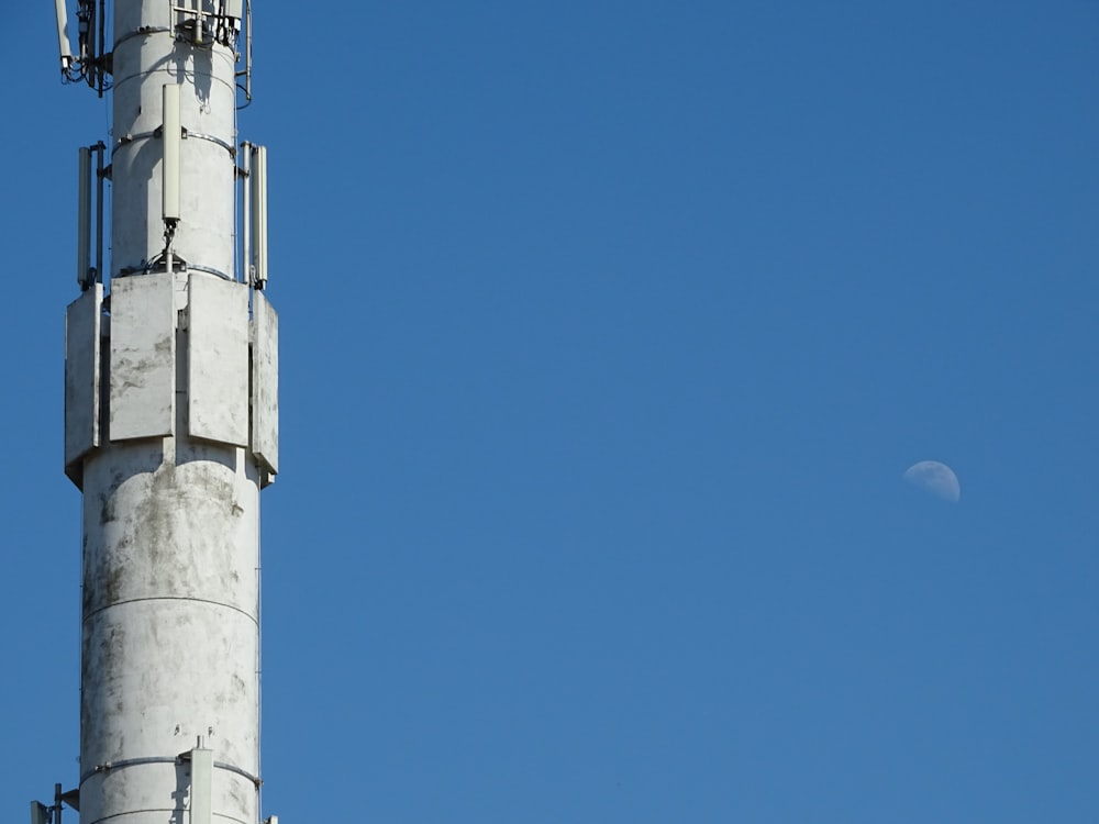 white concrete tower under blue sky during daytime