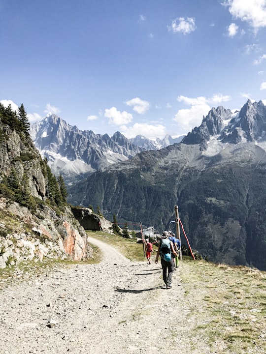people hiking on mountain during daytime in Mont Blanc France