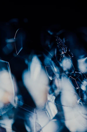 Depth-rich 3D composition featuring layered glass panels with glowing edges.