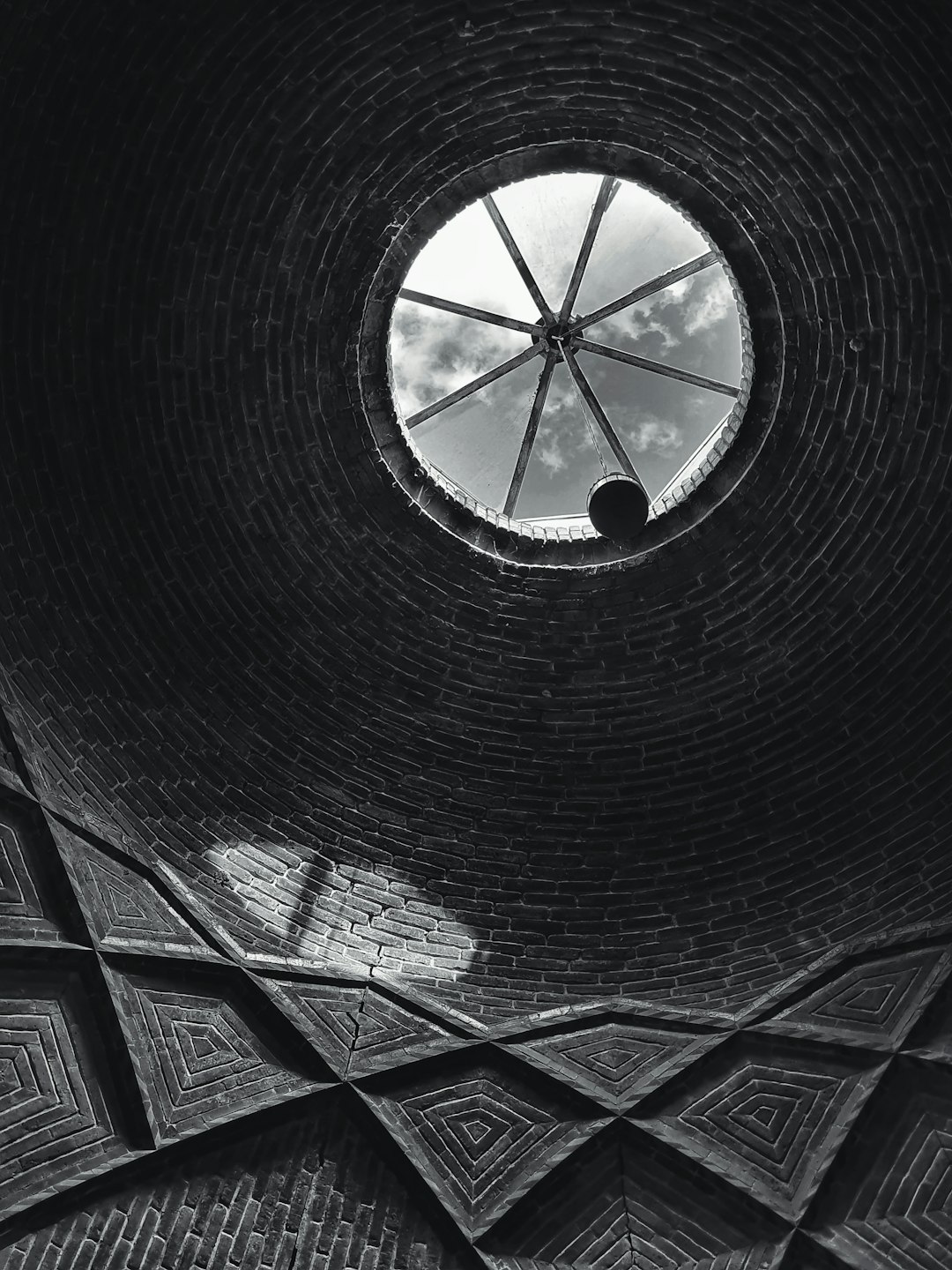 black and white tunnel with glass windows