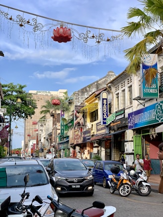 cars parked on street near buildings during daytime