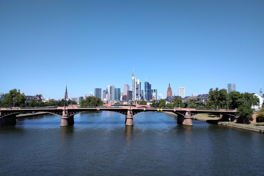 white bridge over river during daytime