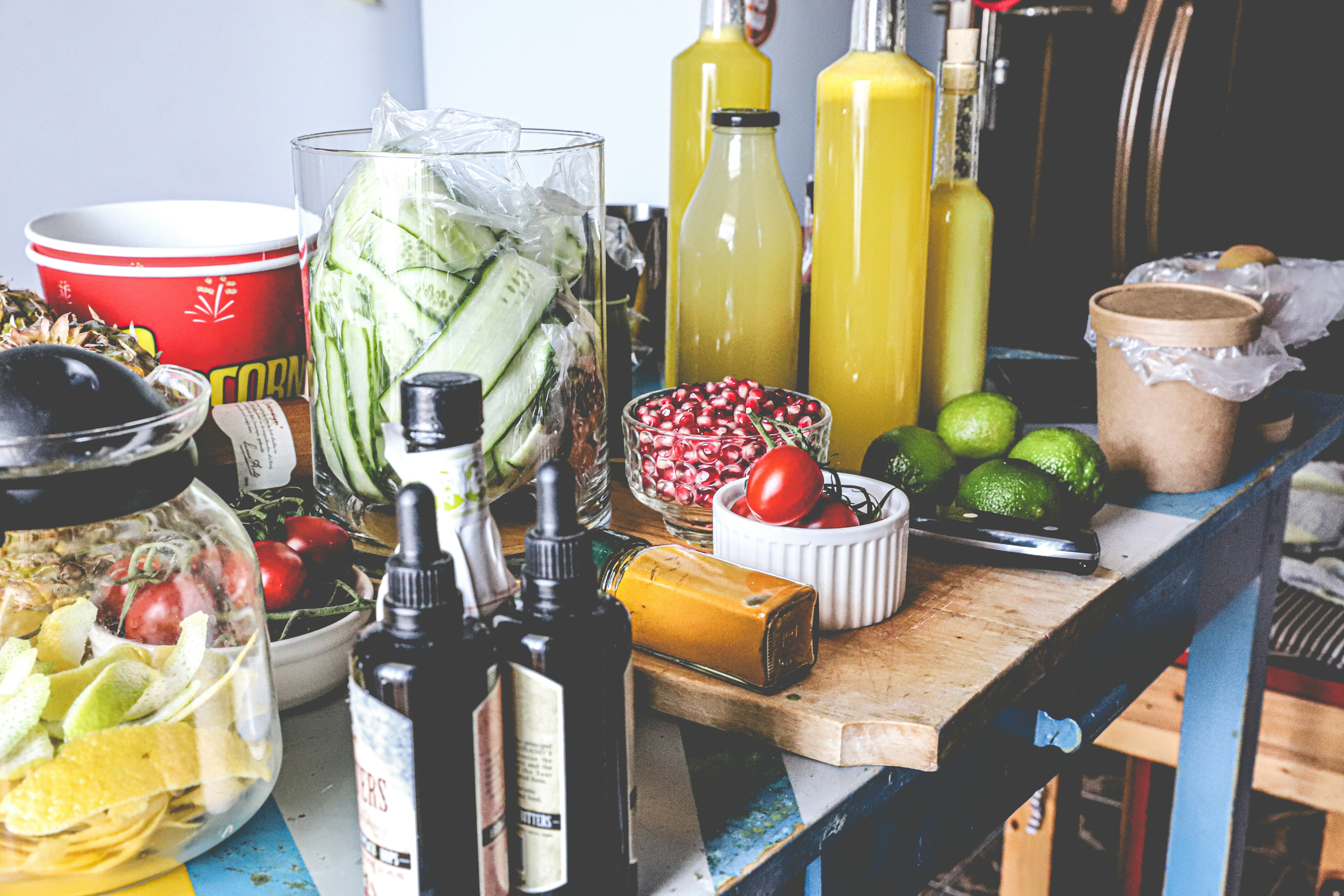 green and red apples on brown wooden table