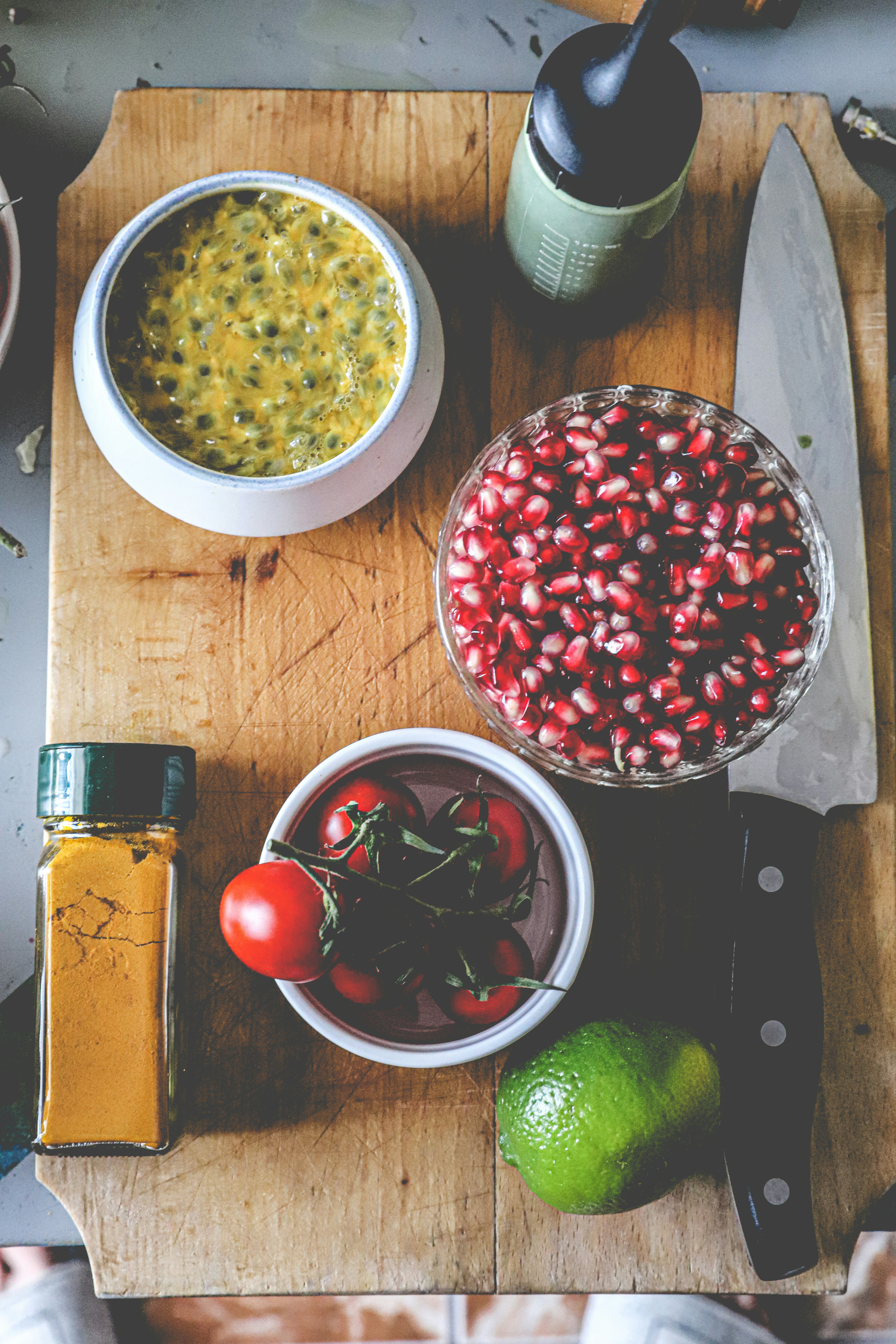 red and white ceramic bowl with fruits