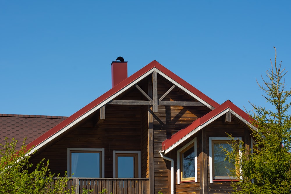 brown wooden house under blue sky during daytime