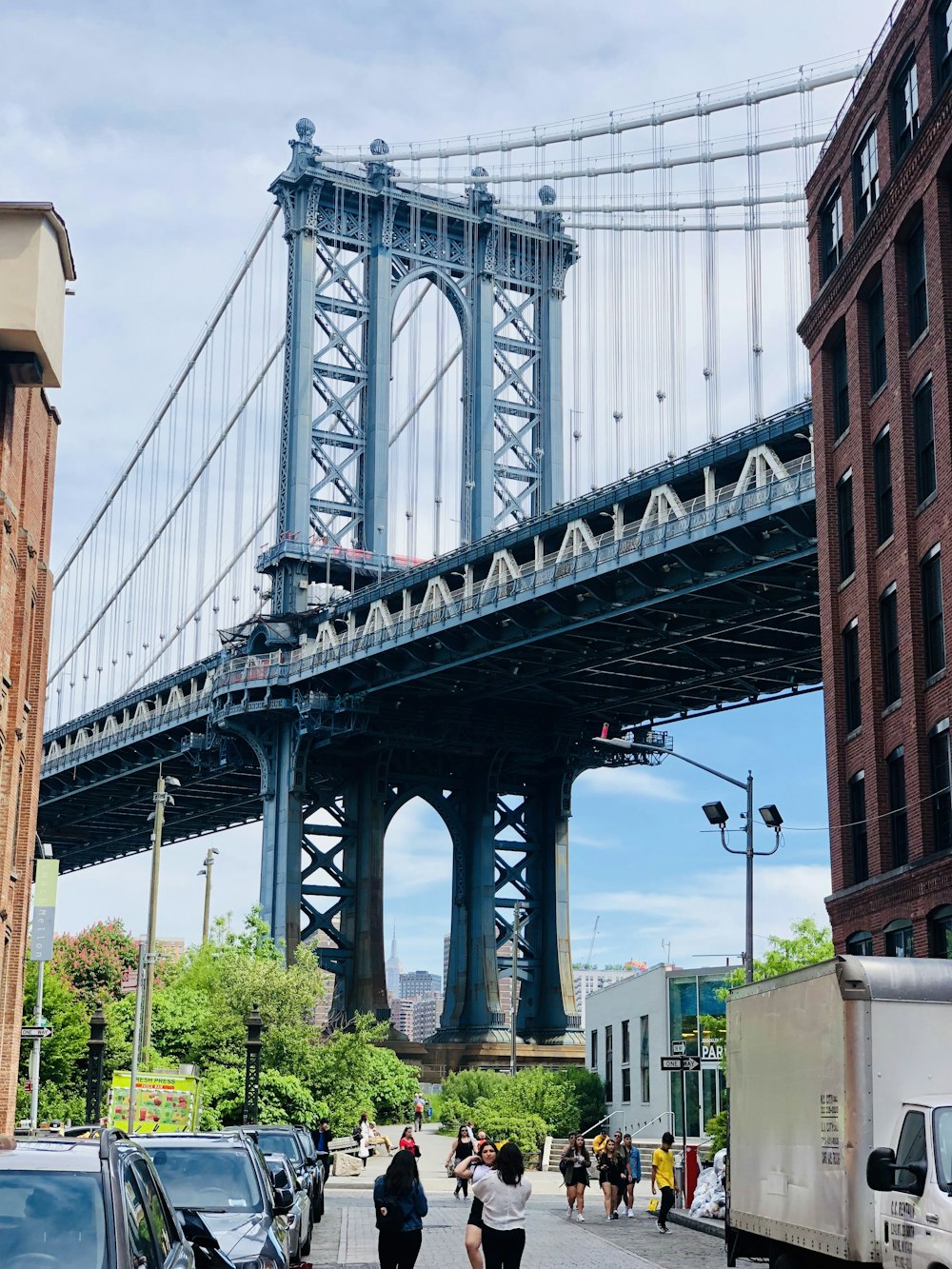 gray bridge under blue sky during daytime