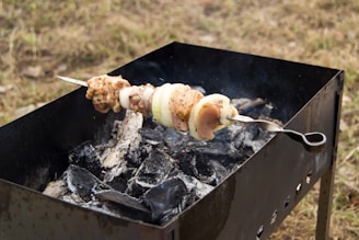 A traditional Argentine barbecue with friends enjoying the meal outdoors.