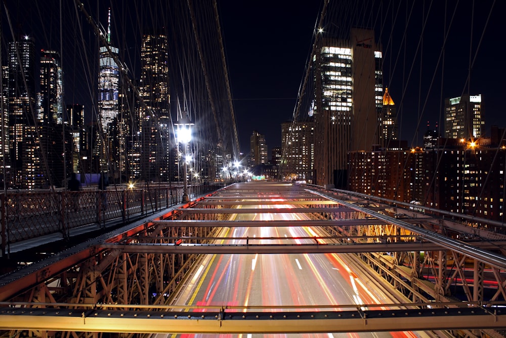 time lapse photography of cars on road during night time