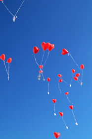 Illustration of a woman peacefully releasing balloons symbolizing toxic relationships.