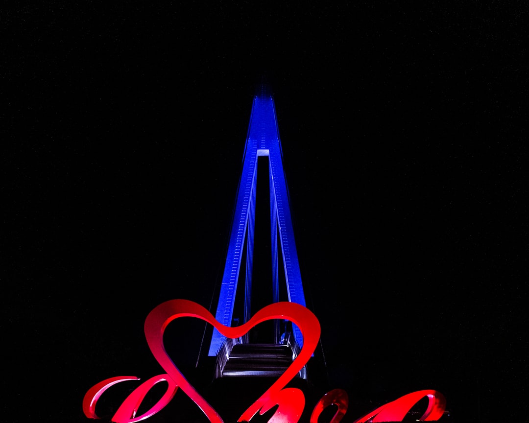 red and blue love neon light signage