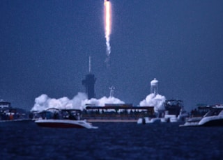 white space ship on mid air during daytime