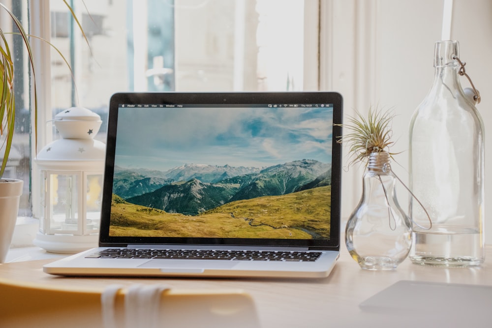 macbook pro on white table