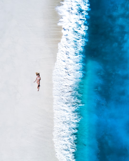 2 person standing on snow covered ground during daytime in Gnaviyani Maldives