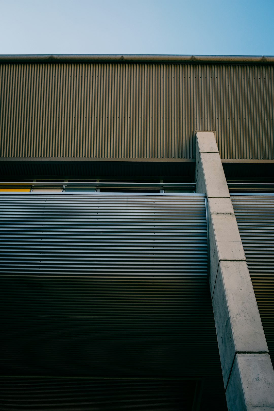 gray concrete stairs with stainless steel railings