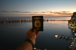 person holding black and white card