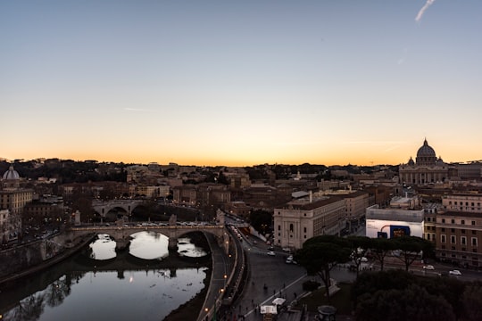 aerial view of city buildings during sunset in Via della Conciliazione Italy