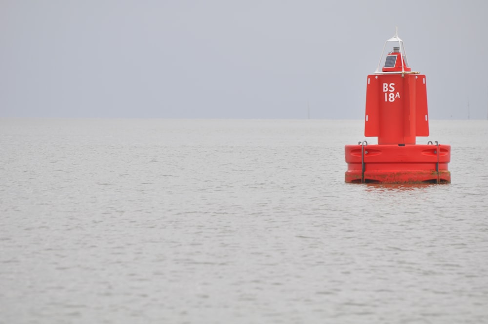 red boat on sea during daytime