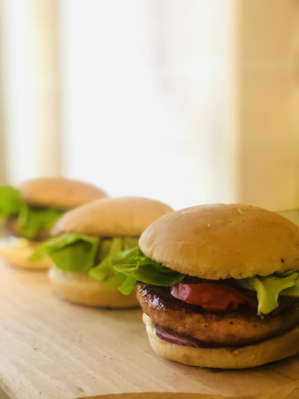 burger on brown wooden table