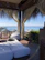 Guests relaxing in the private lounge area of their surf camp room.