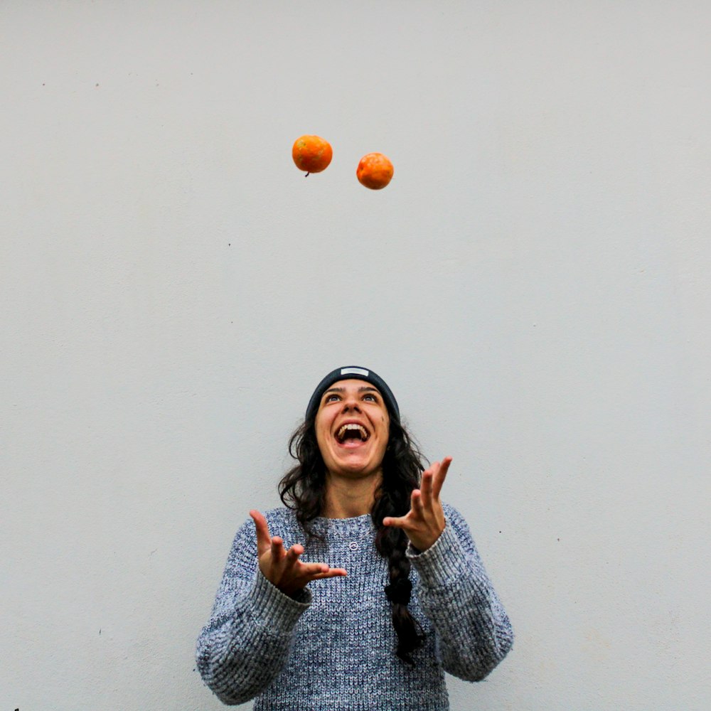 woman in gray sweater smiling