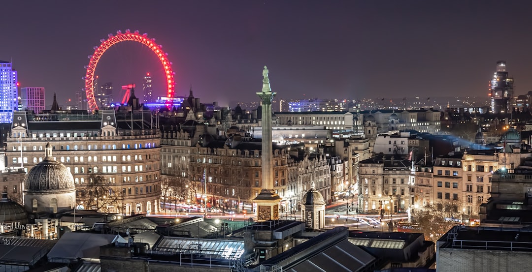 city skyline with lights turned on during night time